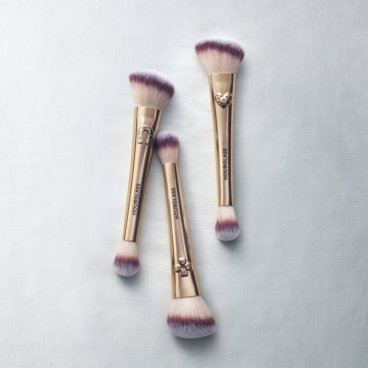 Colección Hourglass Ambient Lighting Edit Brush II con los diseños Wish, Luck y Love