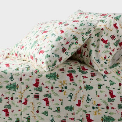 Threshold Holiday Flannel Sheet Set, Sheet set with a cream colored background printed with small red colored houses, green colored trees,… #color_THRESHOLD Winter Scene