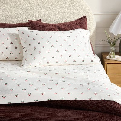 Threshold Holiday Flannel Sheet Set, Flannel sheet set in a white colored ground with a repeating small red colored berry and green… #color_THRESHOLD Berry