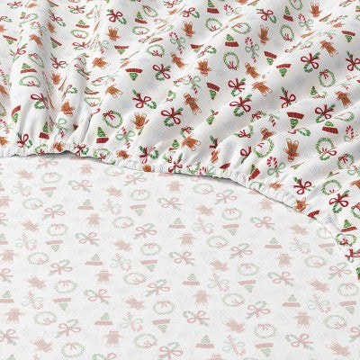Wondershop Holiday Flannel Sheet Set, White colored fitted sheet with red and green colored mini holiday icons featuring gingerbread… #color_WS Mini Icon