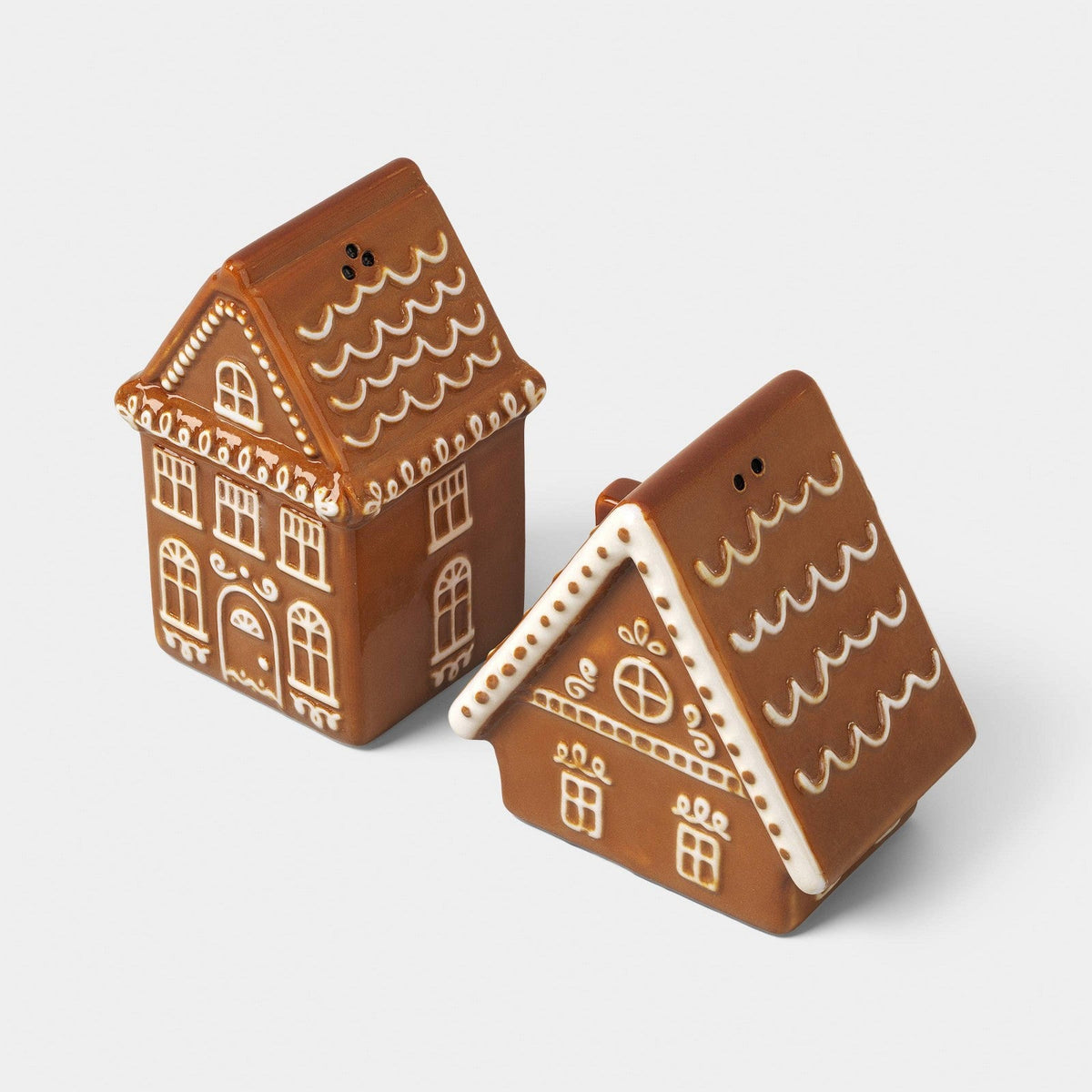 Pareja de salero y pimentero navideños Wondershop con diseño de casitas de jengibre en tono café