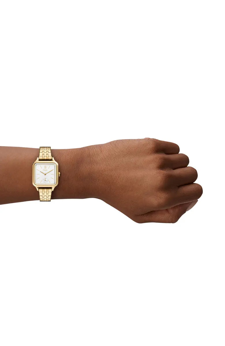 Reloj dorado Fossil para mujer con diseño clásico y moderno