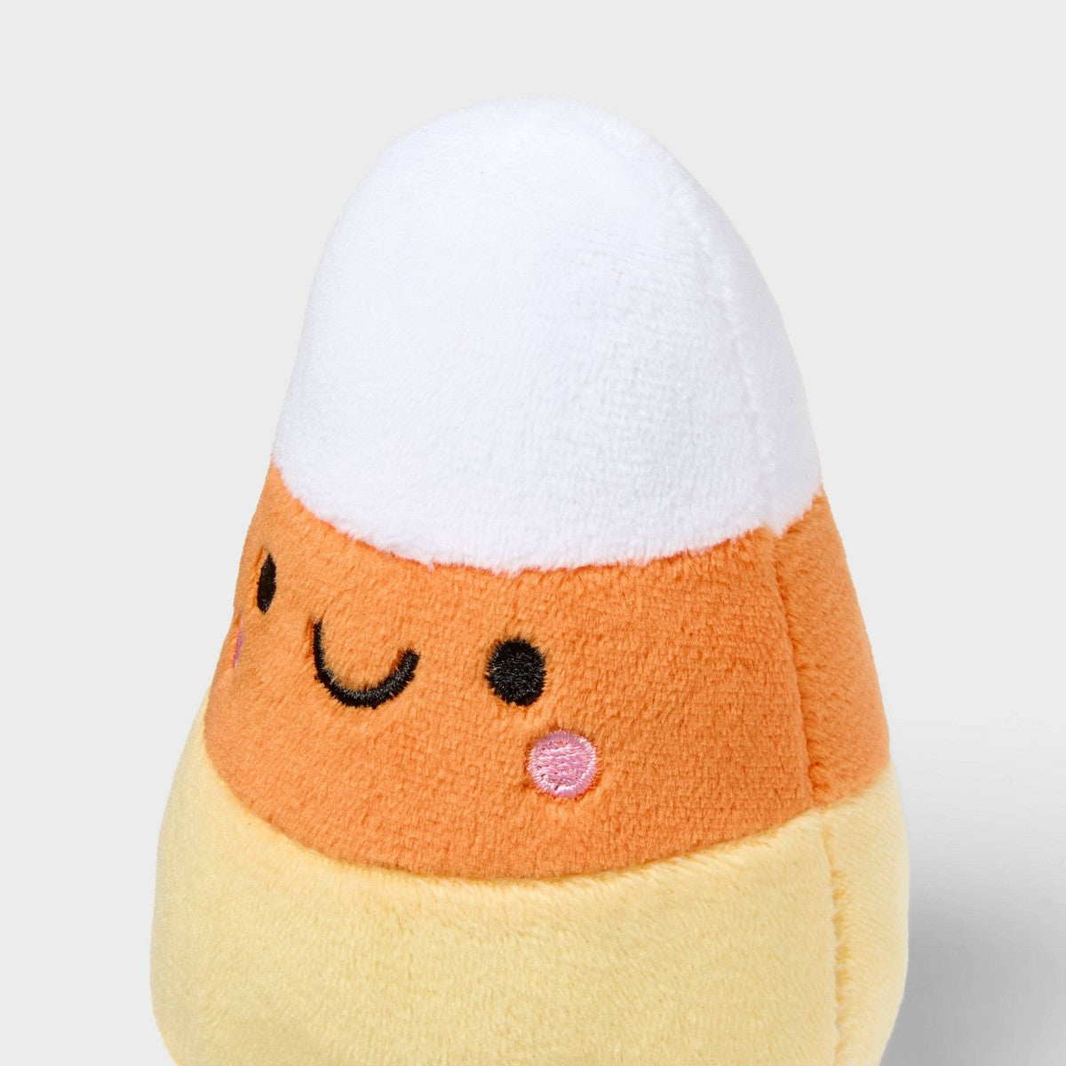 Vista adicional del peluche decorativo Spritz Candy Corn para Halloween