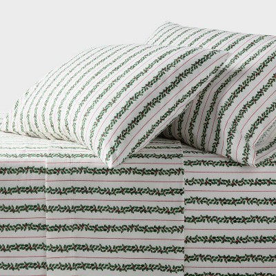 Threshold Holiday Flannel Sheet Set, White colored sheet set with repeating horizontal green colored leaf-garland stripes and thin red… #color_THRESHOLD Botanical Stripe