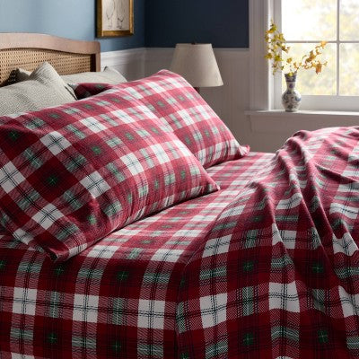 Threshold Holiday Flannel Sheet Set, Red colored tartan plaid sheet set with matching pillowcases featuring white colored and green… #color_THRESHOLD Tartan