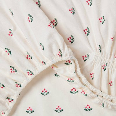 Threshold Holiday Flannel Sheet Set, Cream colored fitted sheet with small red colored berry clusters and green colored leaves in a… #color_THRESHOLD Berry