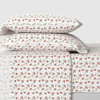 Wondershop Holiday Flannel Sheet Set, White colored sheet set with pillowcases printed with small brown colored gingerbread men, green… #color_WS Mini Icon
