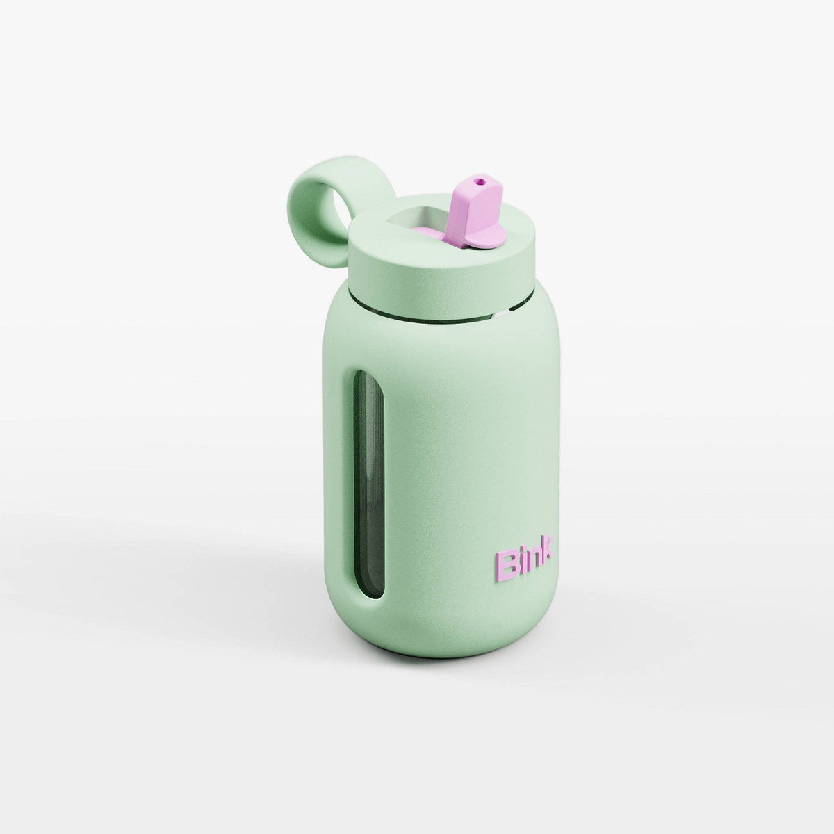 Botella de vidrio Bink Kids de color verde Sea Glass con funda de silicona y tapa abatible #color_BINK Sea Glass