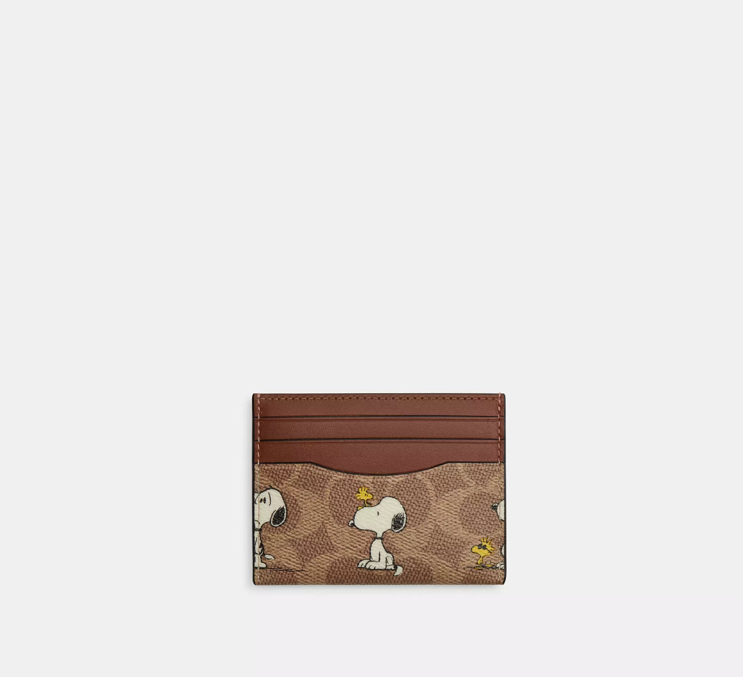 Coach X Peanuts Slim Id Card Case In Signature Canvas With Snoopy Print