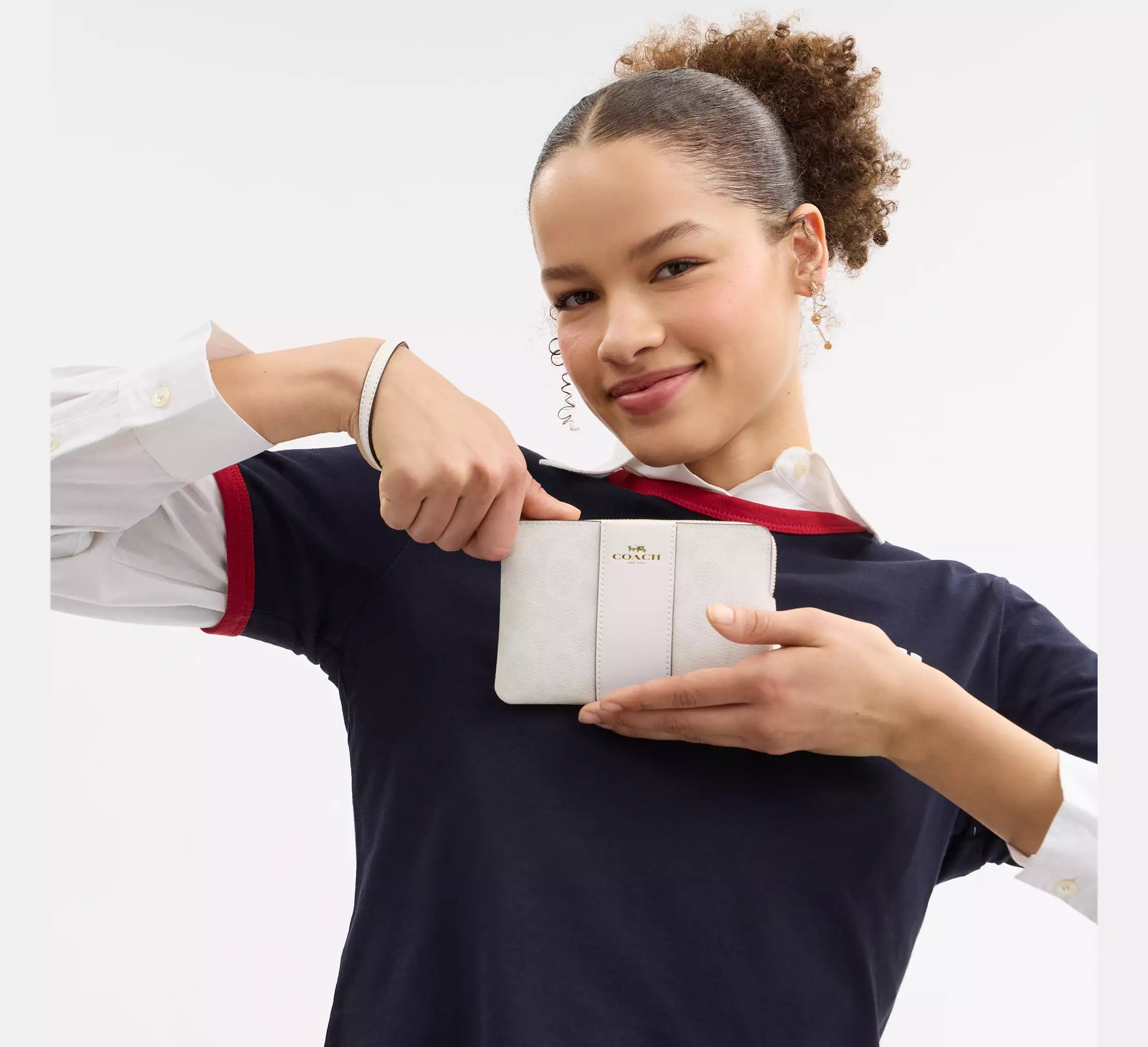 Corner Zip Wristlet In Signature Canvas