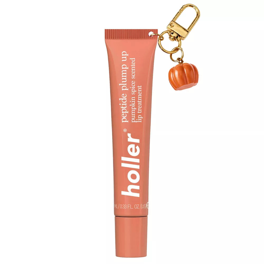 Holler and Glow Pumpkin Spice Lip Serum con charm de calabaza y clip tipo llavero para llevar en la bolsa.