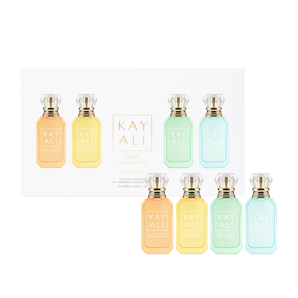 Set de perfumes mini Kayali Vacay in a Bottle con fragancias Capri, Maui, Maldives y Marrakesh en caja de regalo.