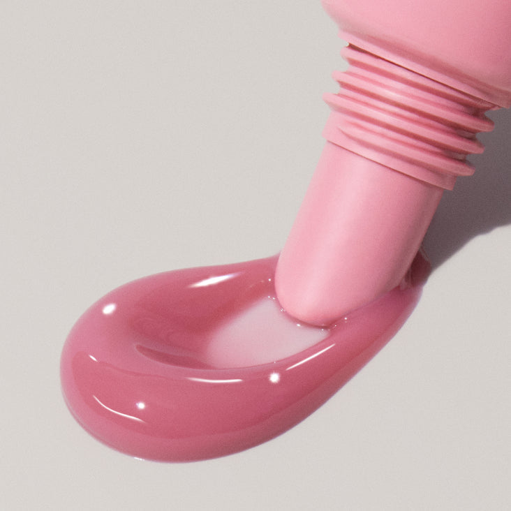 Peptide Lip Tint Ribbon de Rhode, muestra de brillo labial hidratante rosa translúcido con acabado glossy #color_Sprinkle + Ribbon