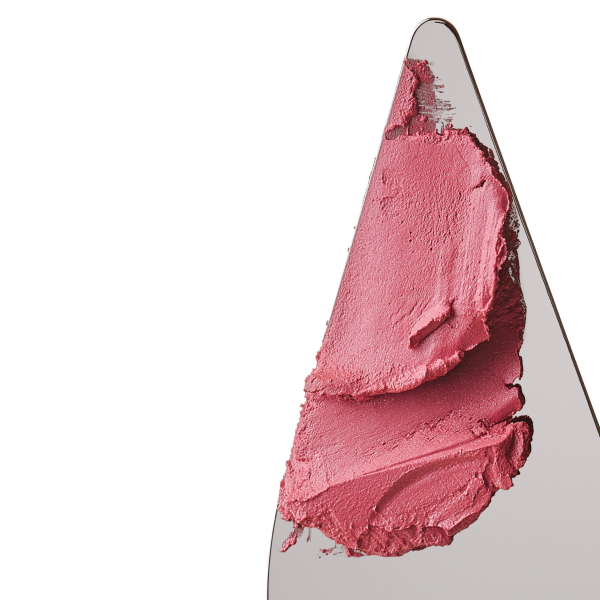 Muestra de textura rosa sobre espátula de Pocket Blush Sprinkle, rubor cremoso para efecto natural en mejillas #color_Sprinkle + Ribbon