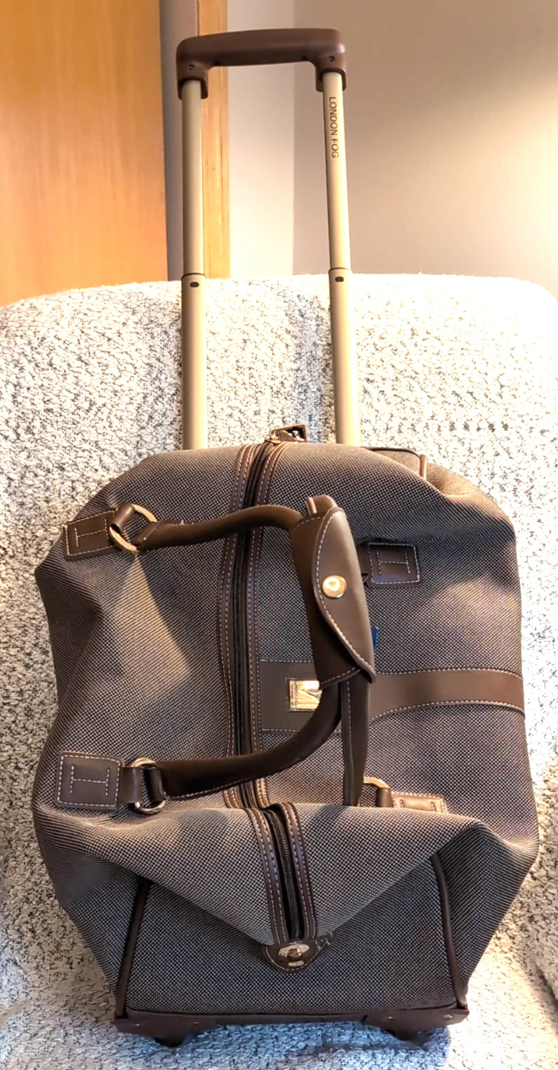LONDON FOG CARRY ON WHEELED LUGGAGE 20” EXPANDABLE AND COMPACT-ABLE