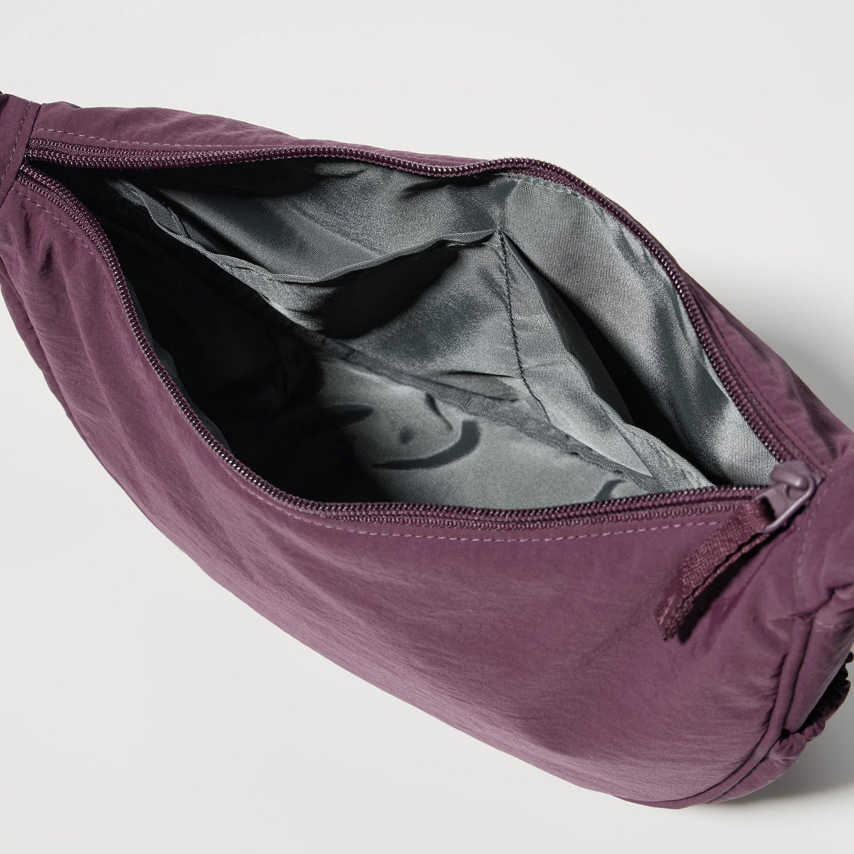 UNIQLO Round Mini Shoulder Bag bolsillos interiores y fuelle